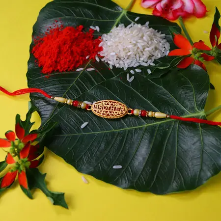 Golden Brother Engraved Rakhi With Traditional Beaded Thread Design