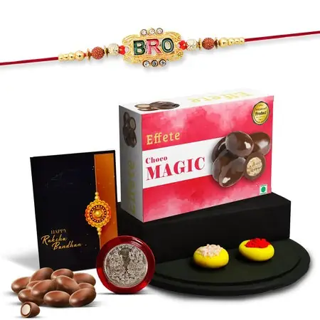 Multicolor Oval Flower Rakhi Bracelet (K1_510_cm32) Chocolate Magic 32gm Silver Color Pooja Coin