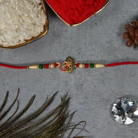Om Peacock Feather Rakhi