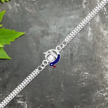 Elegant Peacock Design Rakhi With Blue Enamel And Silver Metal Chain
