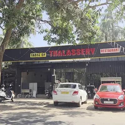TASTE OF THALASSERY RESTAURANT logo