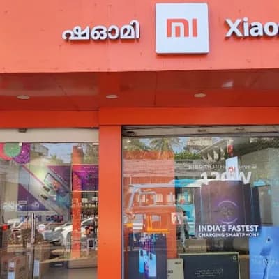 Mi Store Kannur logo