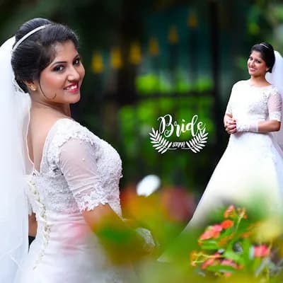 Anna Photos Kottayam logo