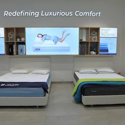 The Sleep Company Experience Store Travancore logo