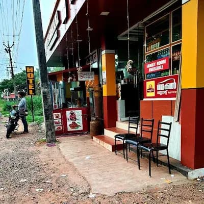 Thavakkal Restaurant logo