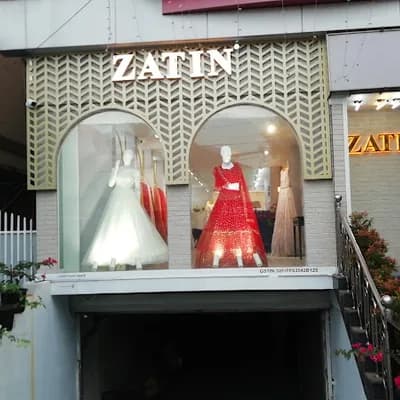 Zatin Designers Thrissur logo