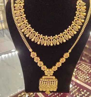 Aneeta Gold Covering logo