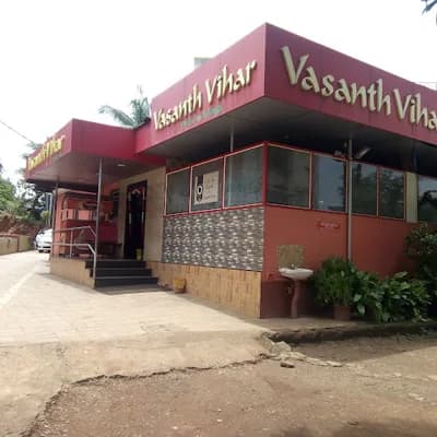 Vasanth Vihar Kasaragod logo