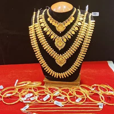 Rajakumari Gold And Diamonds Pothencode logo