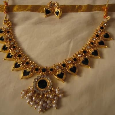 Trichur Fashion Jewellers Velllayani Junction logo