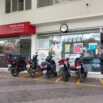 Uniride Honda Service logo