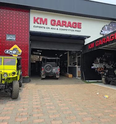 Km Auto Garage logo