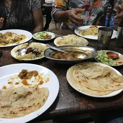 Hassans Family Restaurant logo
