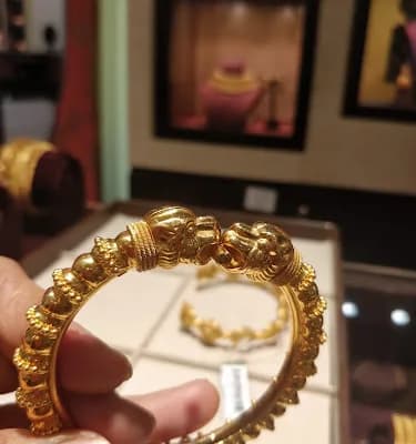 Tanishq Jewellery Calicut Kozhikode logo