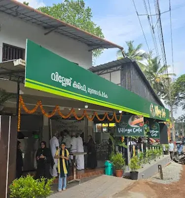 Village Cafe logo