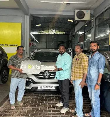 Car And Bike By Mahindra First Choice Carzone Kannur logo