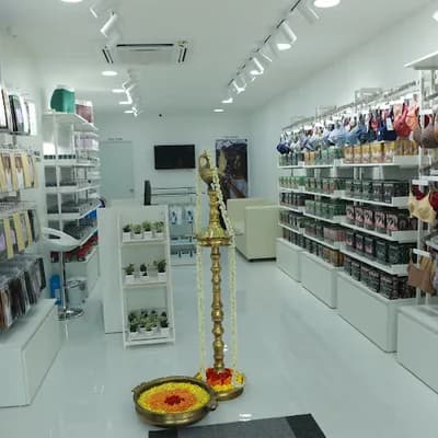 Blossom Exclusive Store Kollam logo