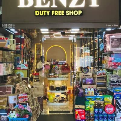 Benzy duty free shop logo