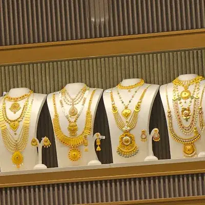 Regal Jewellers Calicut logo