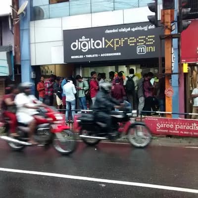 Reliance Digital Xpress Mini logo