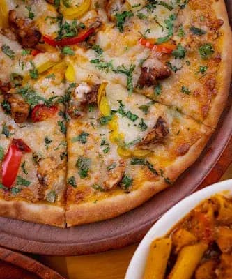 US Pizza | Magnum Mall, Payyanur logo