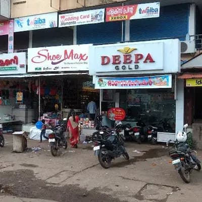 Deepa Gold Kasaragod logo