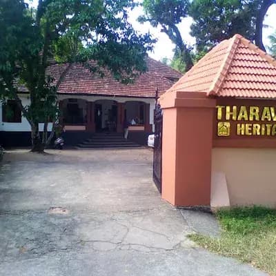 Tharavad Heritage logo