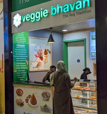 Veggie bhavan The Veg Tradition logo