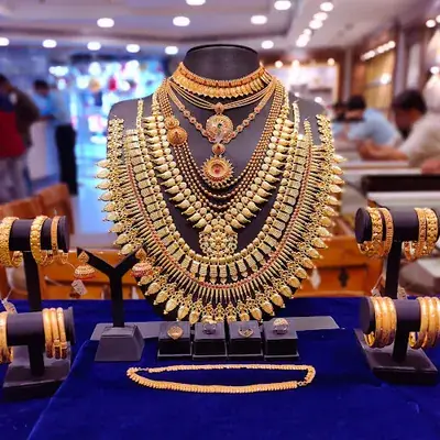 Rajakumari Gold And Diamonds Thiruvananthapuram logo