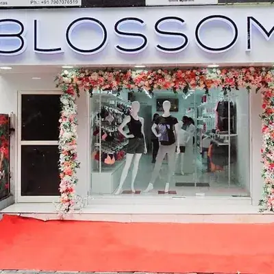 Blossom Exclusive Store Kottayam logo