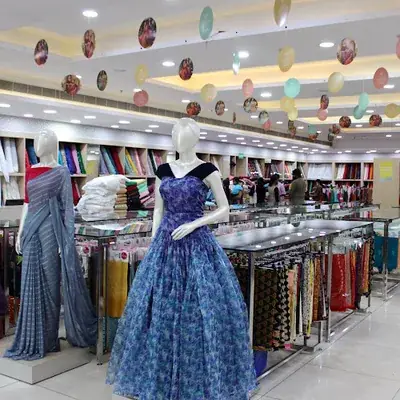 Pulimoottil Silks | Kollam logo