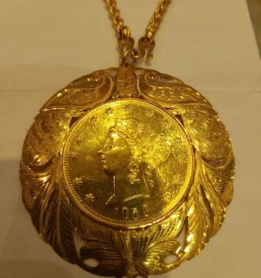 Ameen Gold logo
