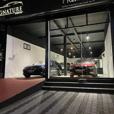 Signature Cars logo