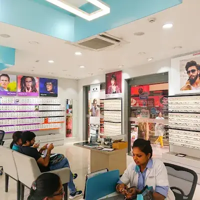 Titan Eye+ At Mg Road Trivandrum Buy 1 Get 1 Free logo