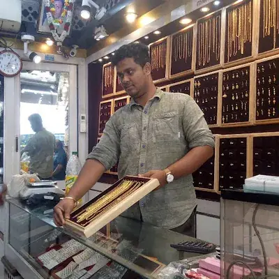Navaneeth Jewellers logo