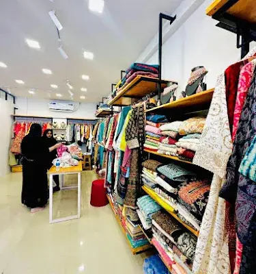 She Boutique logo