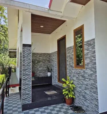 Cherukunnel Jose Home Stay logo