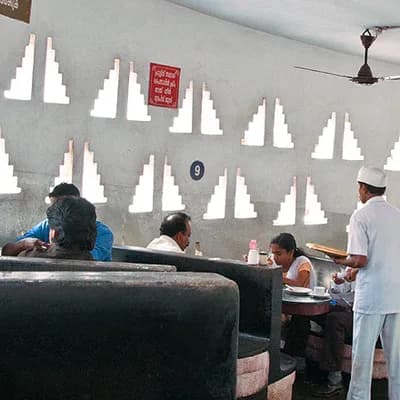 Indian Coffee House Maveli Cafe logo