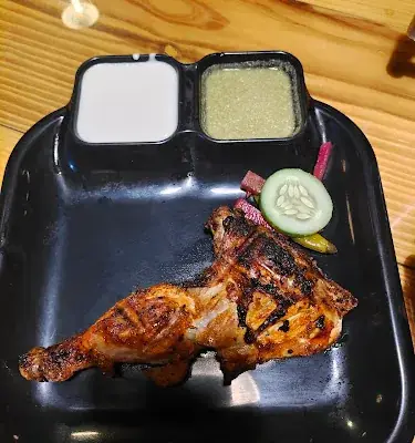 Thaza Restaurant logo