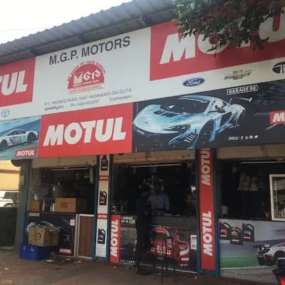 M G P Motors logo
