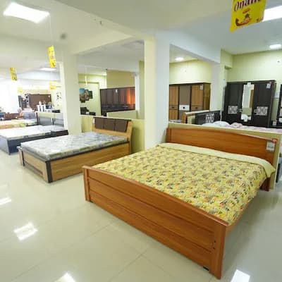 Damro Furniture Trivandrum logo