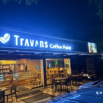 Travans Coffee Point and Resto cafe logo