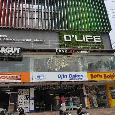 Toni And Guy Calicut logo