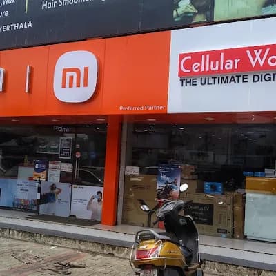 Mi Shop Cherthala logo