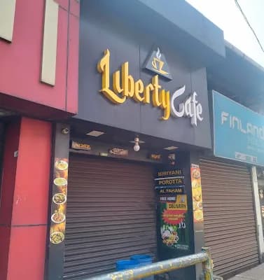 LIBERTY CAFE logo