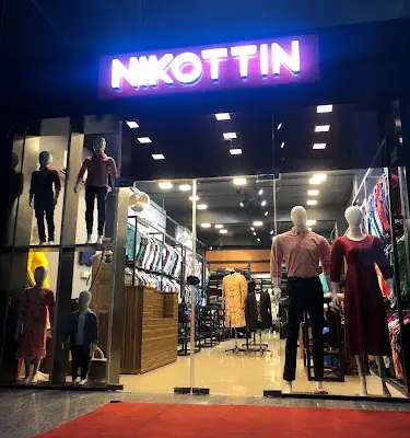 Nikottin Apparels Kasaragod logo