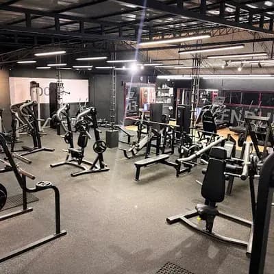Nex Fitness Gym | Largest Fitness Club In Meppadi logo