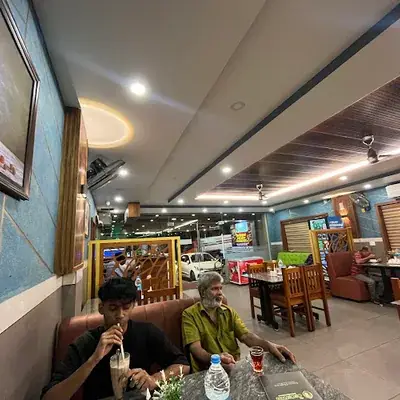 The Coconut Restaurant logo