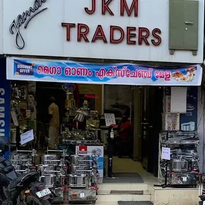 J K M Traders logo