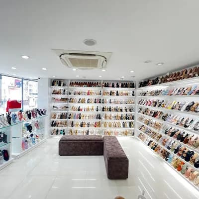 Metrends Shoes And Bags Kannur logo